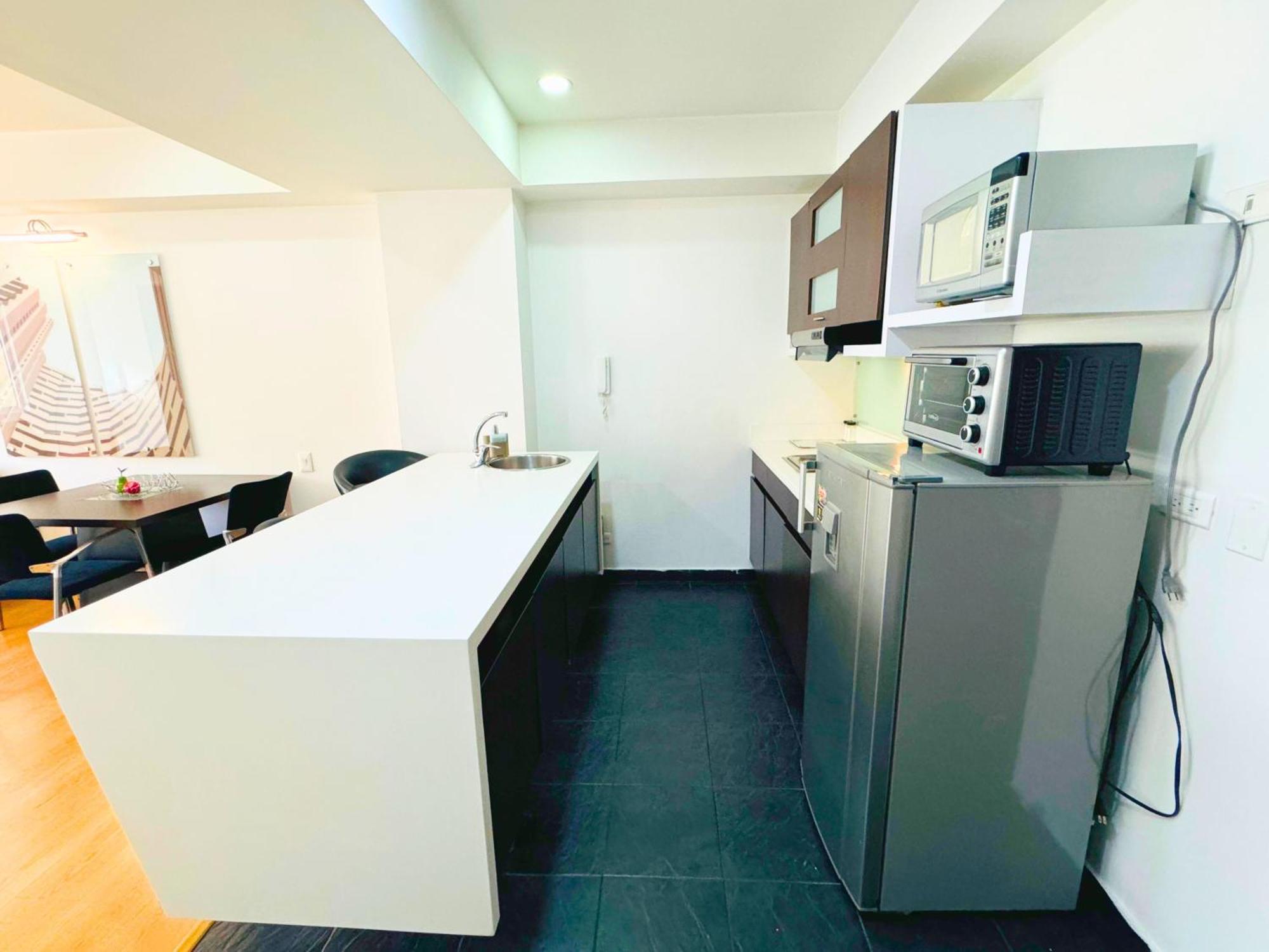 Aparta Suite Continental Богота Экстерьер фото